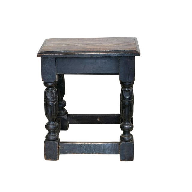 Early 19th century English oak joint stool with hand-carved beveled edges and geometric patterns. Pegged construction...