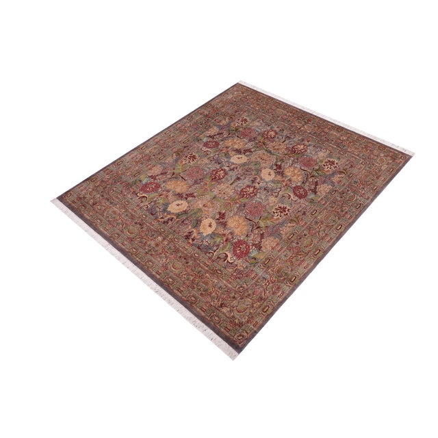 Designed with mesmerizing intricacy and gorgeous color palette, this hand-knotted masterpiece demonstrates the beauty and...