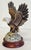 Stately detailed vintage porcelain bald eagle with wings spread on round wood pedestal base. Marked Andrea by Sadek, made...