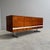 Remarks: Mid century sideboard by Pano, Germany 1960s. Wood veneer with four doors and four drawers. Chrome legs....