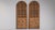 This early 20th century Egyptian Revival door from Egypt is finished in brown, worked in wood. Its design carries the...