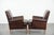 We are offering this beautiful set of two characterful sheepskin armchairs with a beautiful deep color. This comfortable...