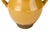 A traditional French earthenware confit jar with a bulbous body and two curled loop handles at the shoulders. The top...