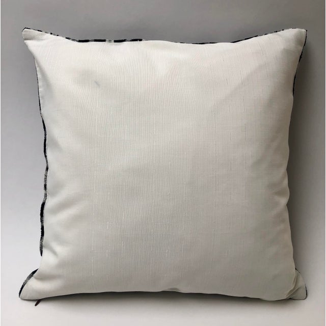 Black and silver gray silk velvet pillow with invisible zipper. Feather pillow insert included.