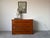Elegant 19th-century German Biedermeier-style chest of drawers crafted with striking burr elm and flamed elm veneers over...