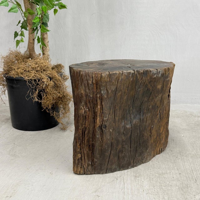 "About This Piece About This Piece Raw, tactile, and timeless, this solid wood stump stool celebrates natures enduring...