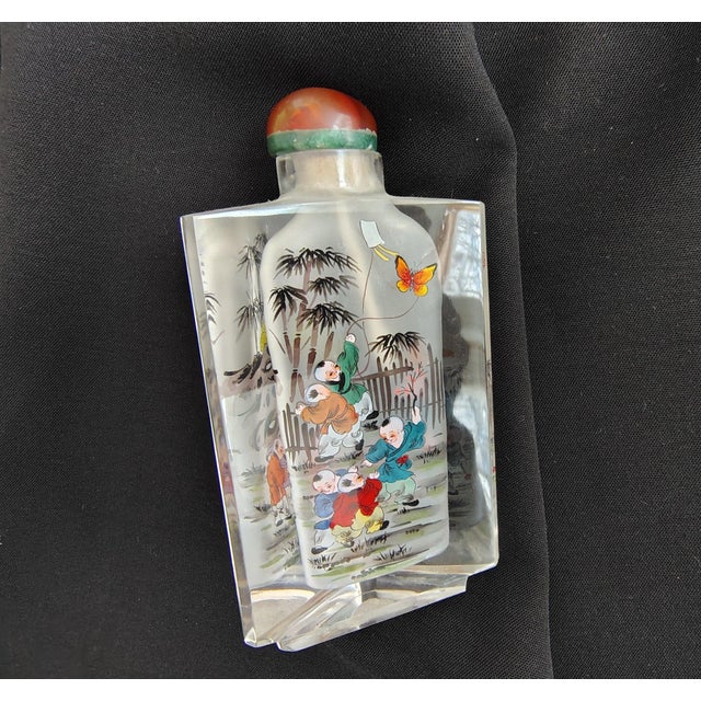 Vintage Signed Chinese Inside-Painted Glass Snuff Bottle – Rare Triangular Form Elevate your collection with this...