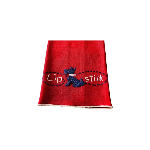Hard-to-find linen lipstick towel (fingertip size) embroidered in cotton and silk with the word “Lipstick” and a Scottish...