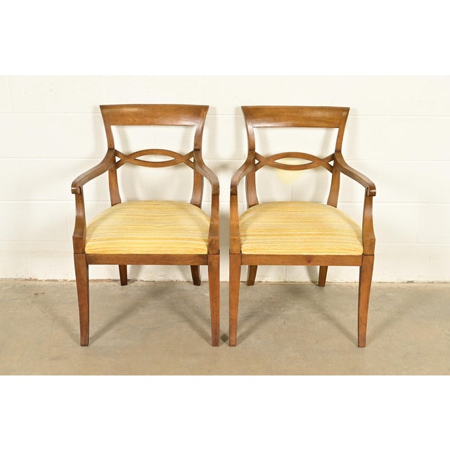 A gorgeous pair of Regency style armchairs or dining captain chairs In the manner of Kindel Furniture USA, Circa 1960s...