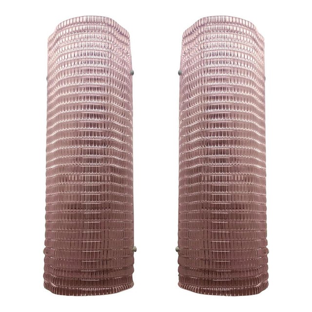 Contemporary wall sconce made in murano glass with a modern diamanted texture that give it bright even if the light is...