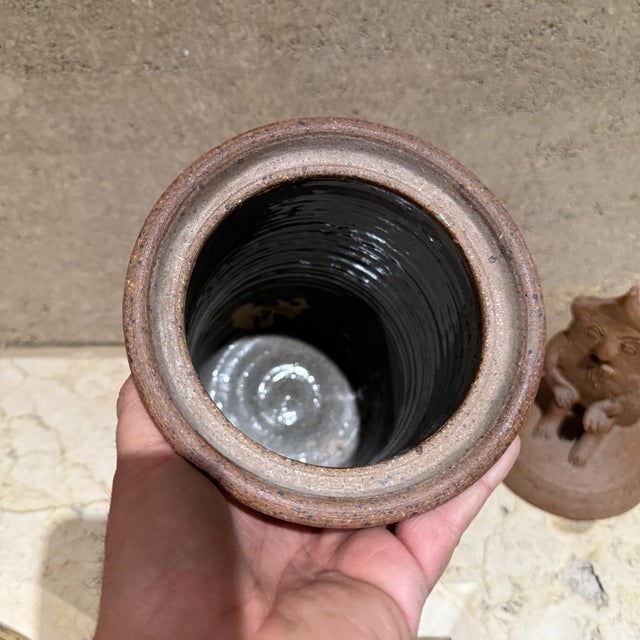 For your consideration, a 1950s Stoneware Pottery Jar or Cookie Jar. Mid-century period. Dimensions: 16.75 h x 6.25...