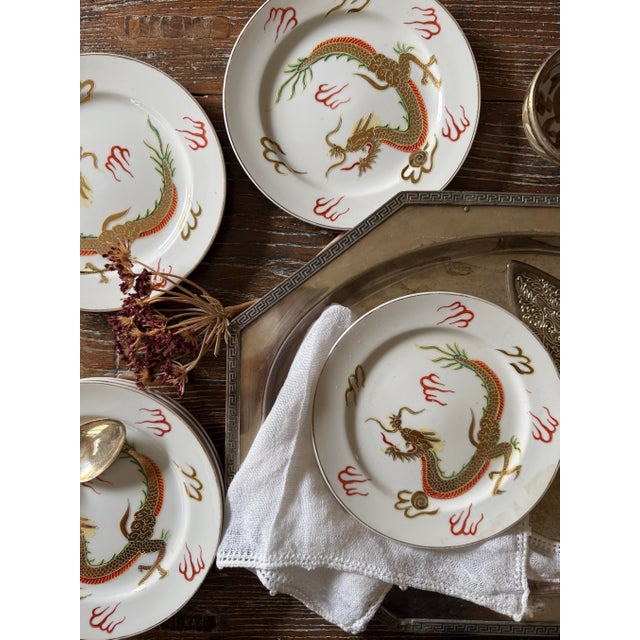Striking set of six vintage Japanese Dragonware porcelain plates featuring the wonderfully dramatic raised decoration...
