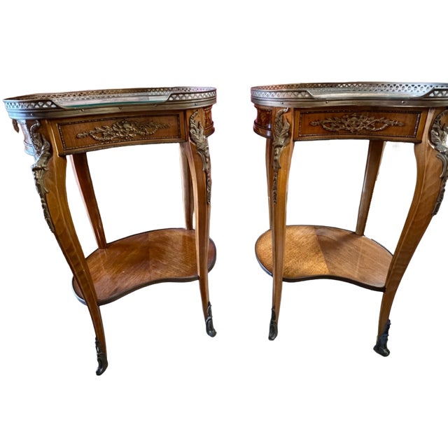 Pair of vintage Italian kidney-shaped marquetry side tables, featuring a classic mid-to-late 20th-century Rococo Revival...