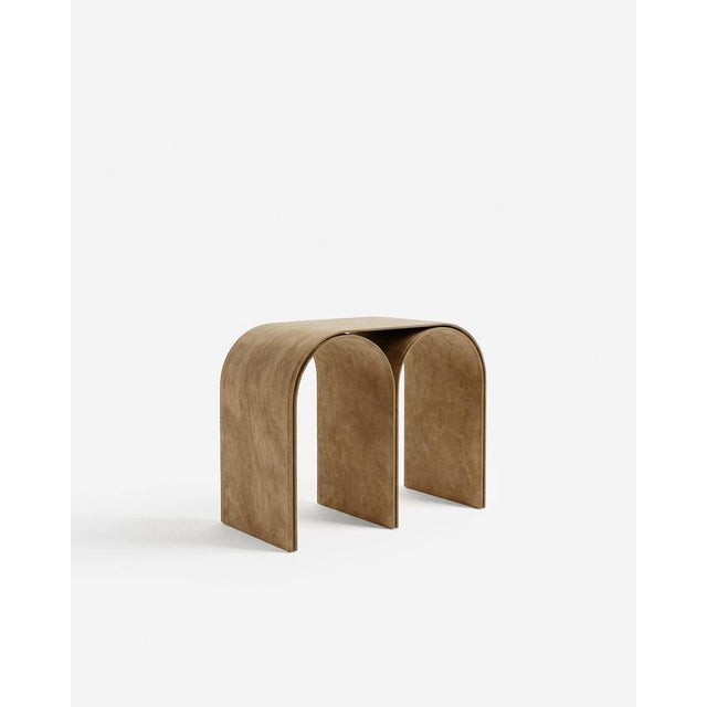 Contemporary nabuck arch stool in steel and leather by pietro franceschini. Dimensions: w 54 x l 31.5 x h 43 cm....