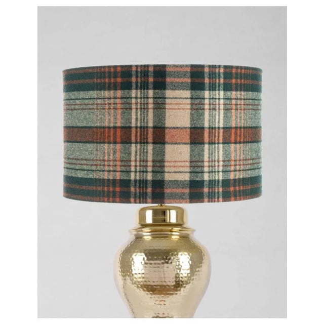 Referencing the pop music festival which took place in 1967, MONTEREY PLAID GREEN stands out with terracotta stripes...