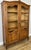 This elegant Vintage French Louis bookcase combines graceful styling with practical storage, featuring an attractive oak...