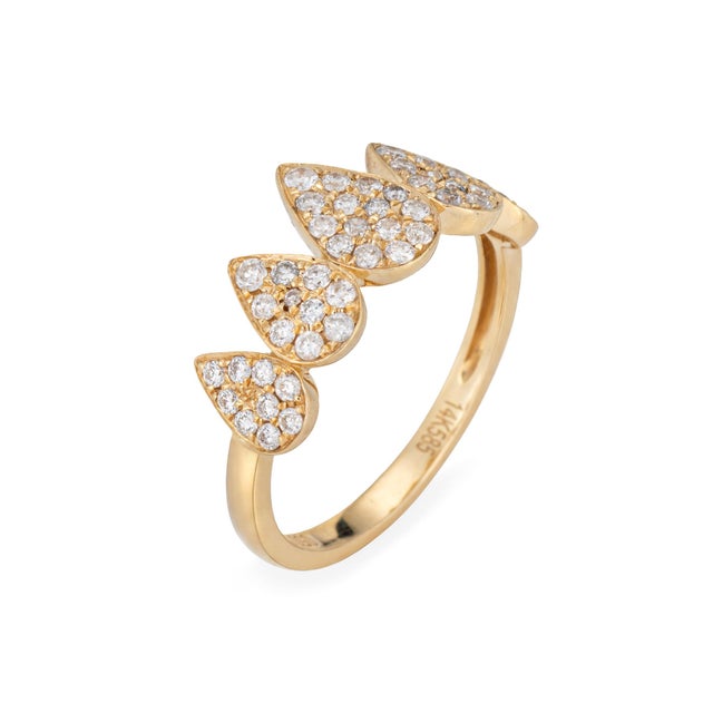 Stylish contemporary diamond ring crafted in 14k yellow gold. Diamonds total an estimated 0.50 carats (estimated at I-J...