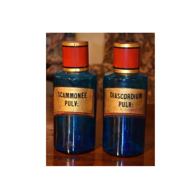 French 19th century blue apothecary jars (2). Please notice blown glass pontil mark at the bottom of each as well as the...