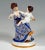 Very rare meissen art nouveau porcelain group: mother in a dress decorated with elaborate art nouveau decor sitting on a...