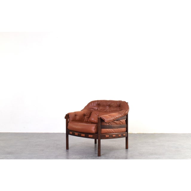 Designed by Arne Norell and manufactured by Coja in Sweden in the 1960s, this armchair is a prime example of Scandinavian...