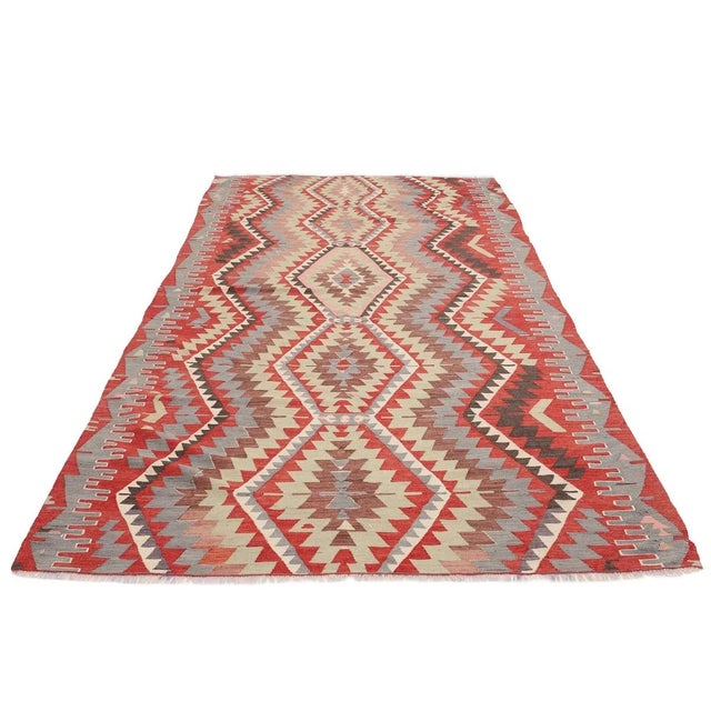 Vintage handwoven decorative kilim rug from Denizli region of Turkey. Approximately 50-60 years old. In very good condition.