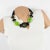 Elegant Angela Caputi, made in Italy resin choker necklace. Working on black and green contrast, this necklace features...