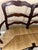 This vintage Indonesian double-seat bench features classic French Country styling with ladder-back construction,...