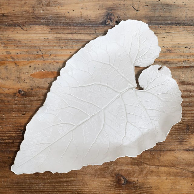 A large studio-made porcelain leaf platter cast from a real leaf, and finished with a clear glaze. Marked in green with...