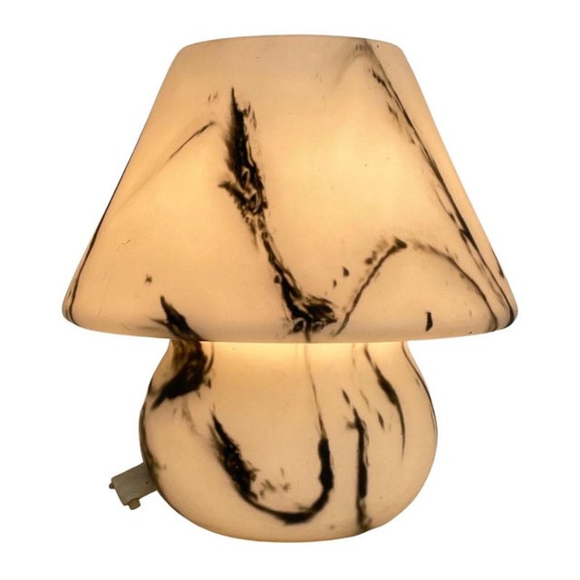 PecoraNera is a one of a kind Mushroom Lamp realised by expert glass blowers in the heart of Murano in the late 70s. It's...