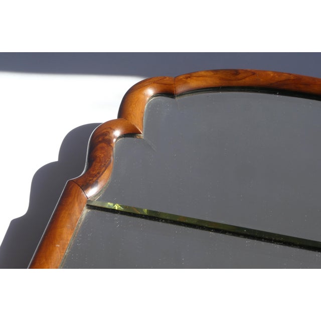 Original antique wooden scalloped mirror with a nice brown lacquered frame made out of oak with a beveled glass. Made in...