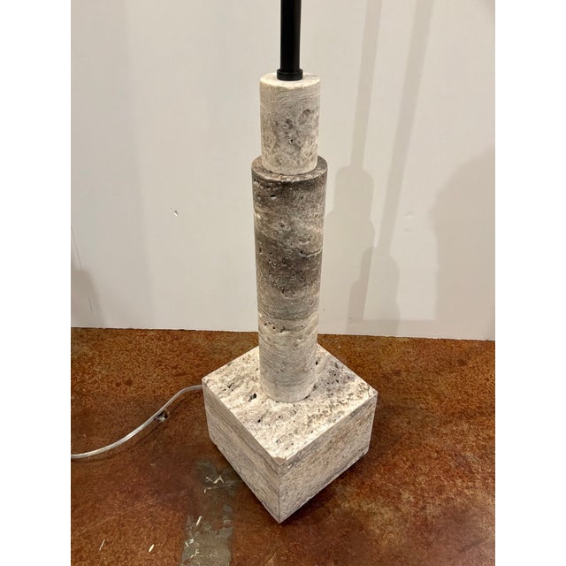 Stylish Revelation Telescope Floor Lamp. Travertine base, dark bronze body and metal shade. Original Retail $1026....