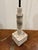 Stylish Revelation Telescope Floor Lamp. Travertine base, dark bronze body and metal shade. Original Retail $1026....