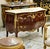 Experience the grandeur of European craftsmanship with this magnificent French Rococo-inspired dresser, masterfully...