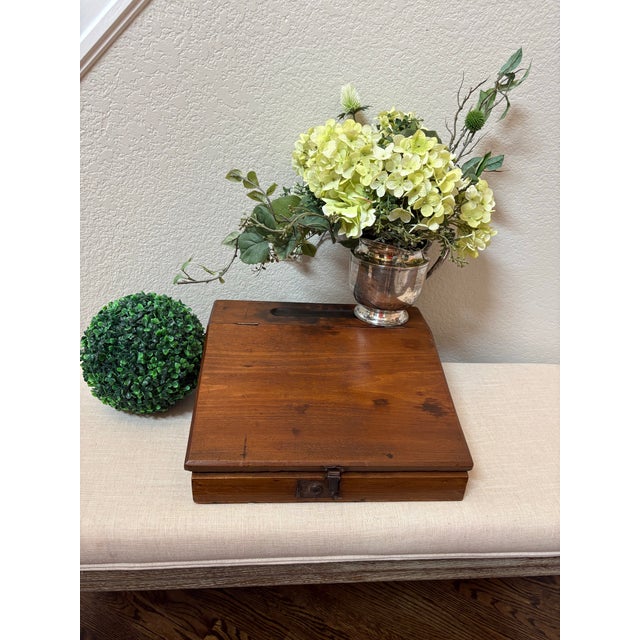 Rich with authentic antique patina, this late 19th-century Victorian writing slope was designed as a portable lap desk for...