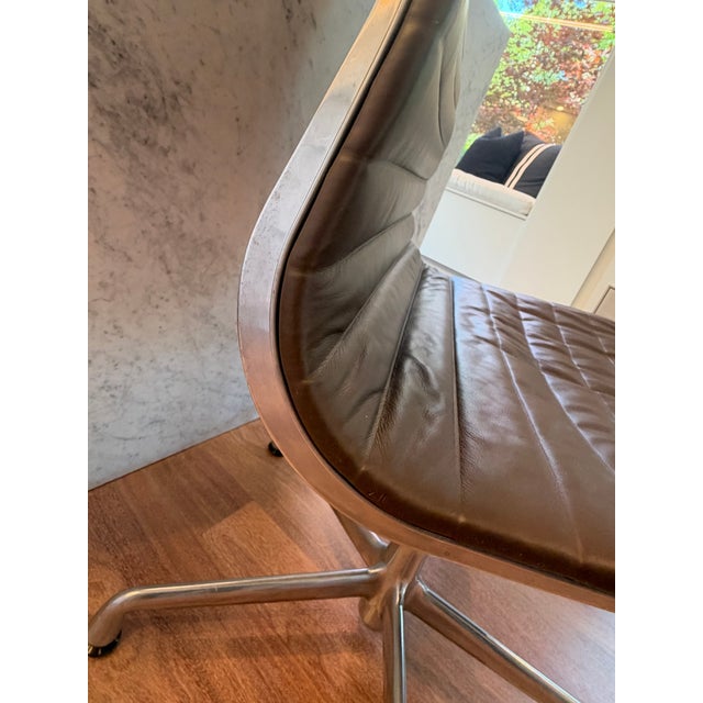 Authentic Herman Miller Eames Aluminum Group Management Chair (Model EA330), designed by Charles and Ray Eames. This chair...