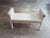 Vintage white washed wicker bench with carved wood front and Scrolled Arms . This is a perfect bench for any décor You can...