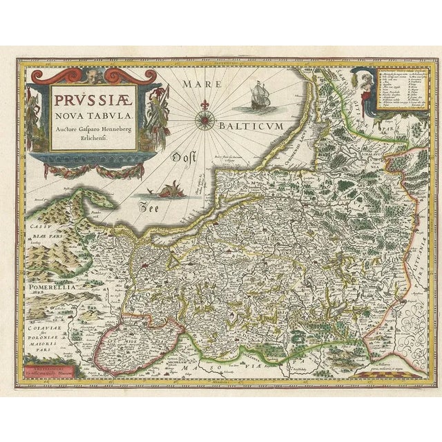 Antique map titled 'Prussiae Nova Tabula'. Rare early edition of Blaeu's map of Prussia, embellished with a gorgeous large...