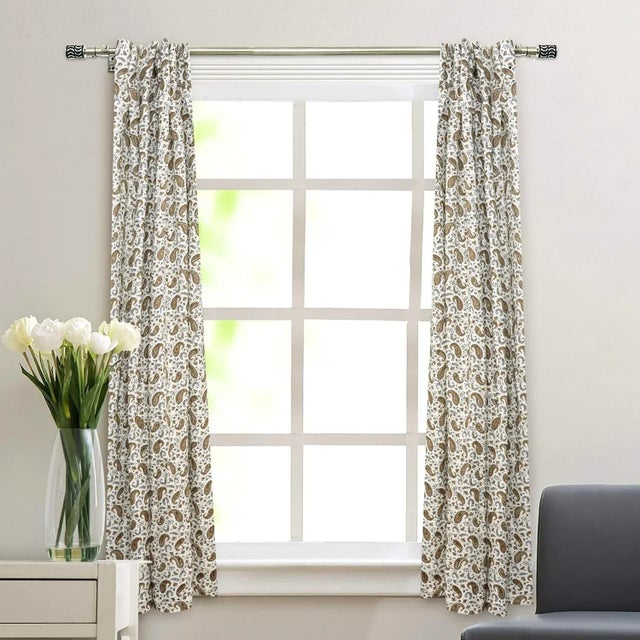Elevate your home décor with our handcrafted block print curtain, made from premium coloured linen for a soft, durable,...