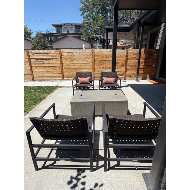 Set of four (4) Brown Jordan Outdoor Chairs. Stretch Collection by Richard Frinier. Brown metal frame with brown elastic...