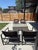 Set of four (4) Brown Jordan Outdoor Chairs. Stretch Collection by Richard Frinier. Brown metal frame with brown elastic...
