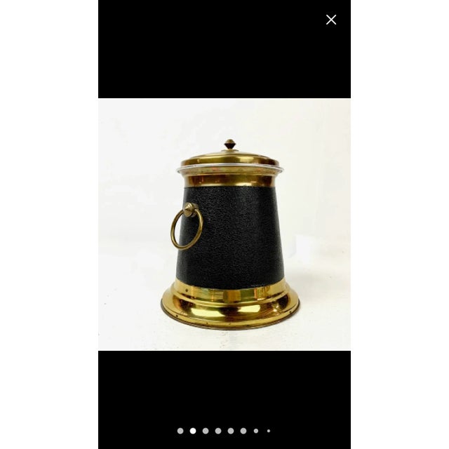 Chic Art Deco ice bucket with brass base, handles, and lid, black textured faux leather outer casing with steel liner...