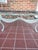 Add timeless charm to your outdoor living space with this beautiful vintage-style patio table featuring an ornate,...