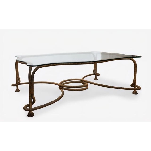 Striking coffee table designed by Emilio Rey in the 1970s, exemplifying the decorative spirit and artisanal quality of...