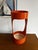 70s orange, baby! Totally space-age, too. In short, a design piece that’s not only practical but also has a playful look....