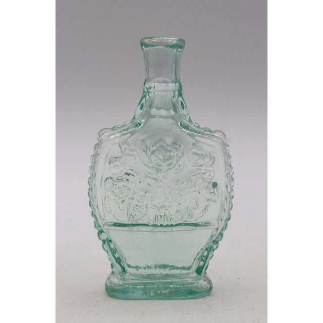 Circa 1840s American aquamarine glass "Fancy Cologne" bottle. Sparking clear glass aquamarine blow in a 2-part mold...