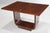 circa 1930, foldover swivel top, interior compartment, U shaped support, sloped plinth base, 7-1/4 x 31 x 21-1/4 in.