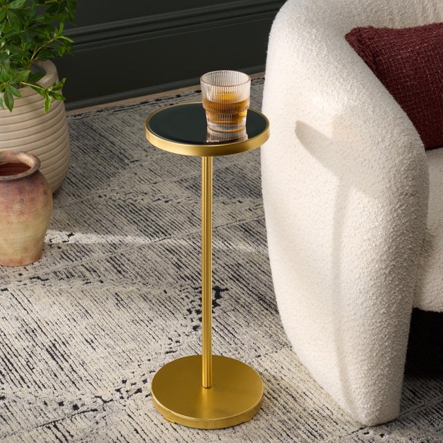 Experience the fusion of elegance and modern style in your living space with our PAKU Round Side Table. Expertly crafted...