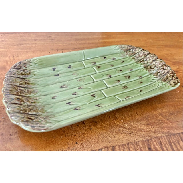 Display this vintage Bordallo Pinheiro asparagus serving platter as decor in a dining room or kitchen. This popular...
