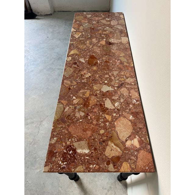 Striking and sculptural, this 1980’s vintage Brutalist console table showcases a powerful blend of raw metal craftsmanship...