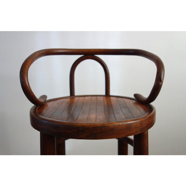 Rare children's high stool in bentwood. Superb patina. This model is a taller version of the Thonet 209 model, also known...